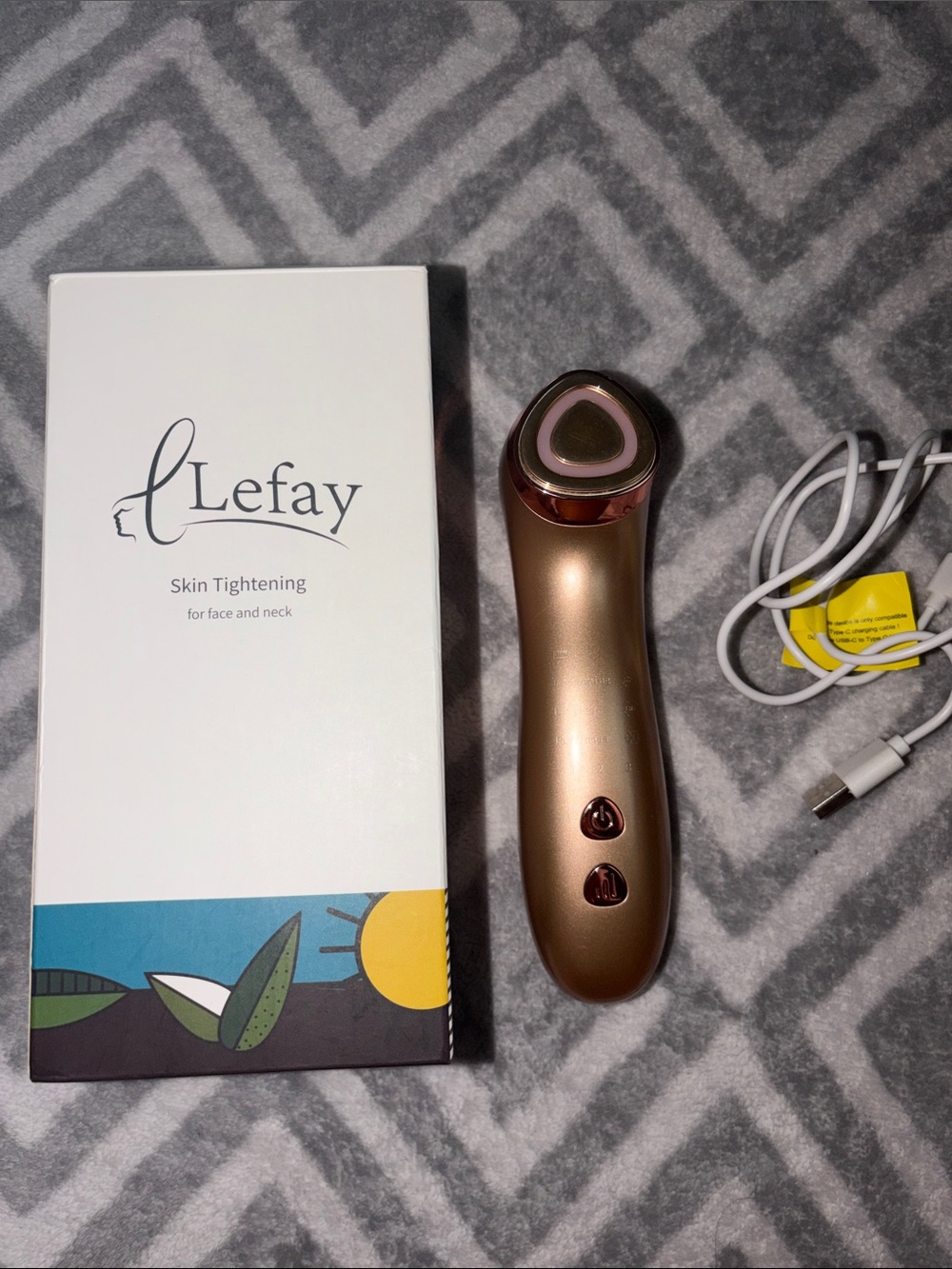 Rose Gold Facial Skin Tightening Device with USB Cable